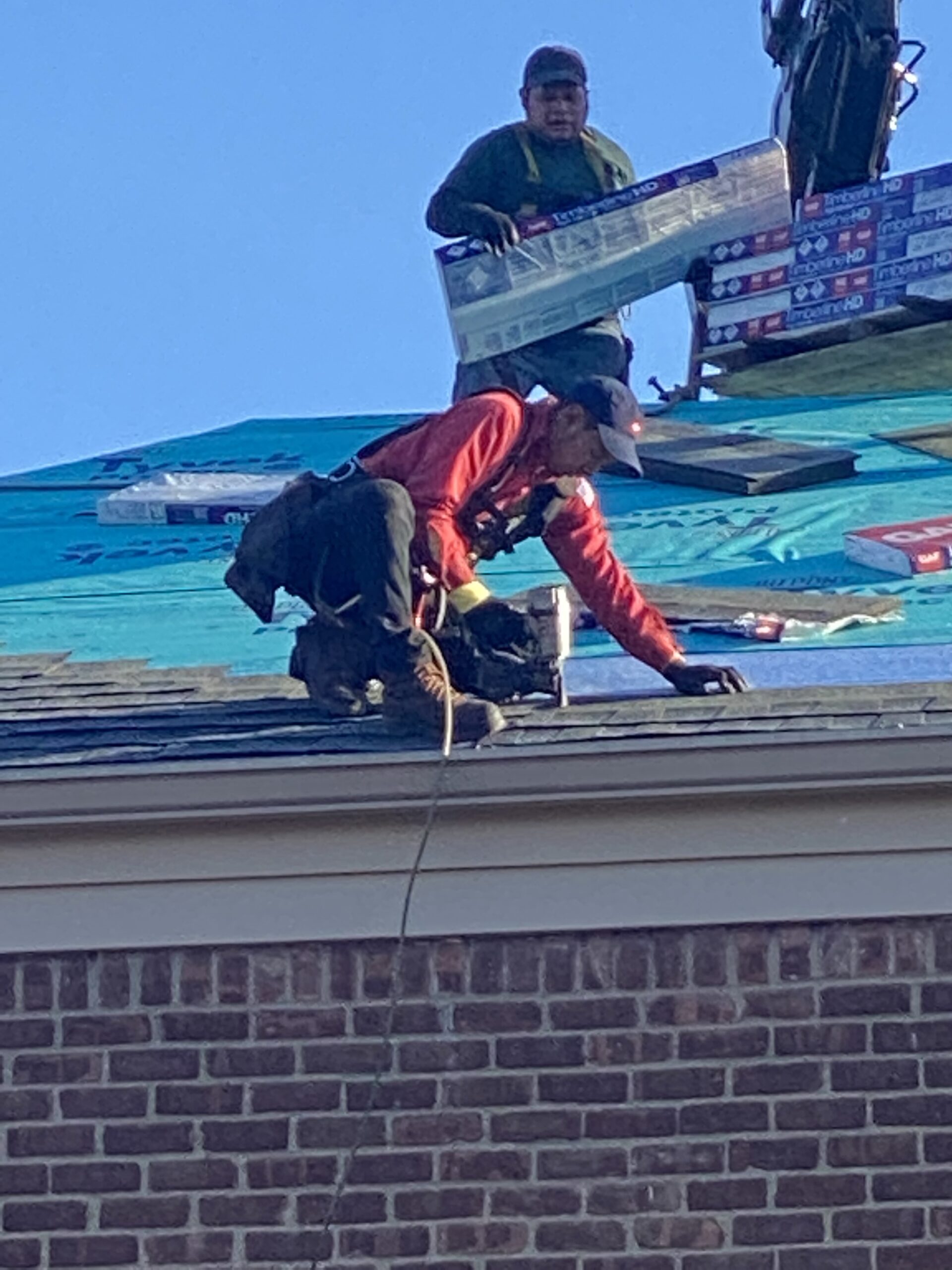 County Roofing Systems employee repairing a roof