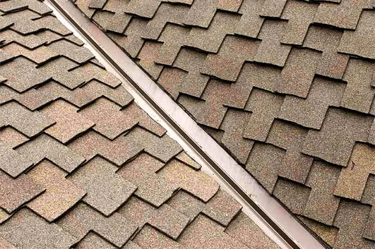 Valley flashing on a roof with architectural shingles